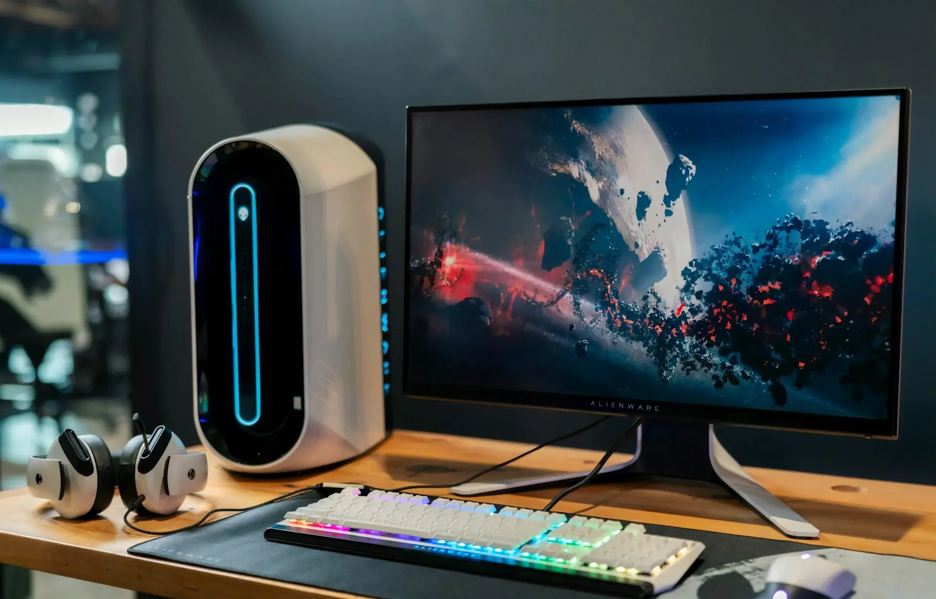 black flat screen computer monitor beside white computer keyboard